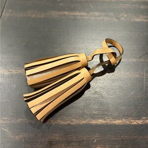 Tan Coach Legacy Tassel
